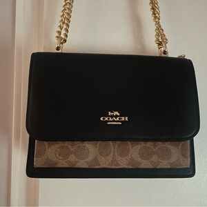 Coach Black and Tan Cross Body bag